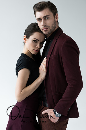 beautiful hugging couple, isolated on grey