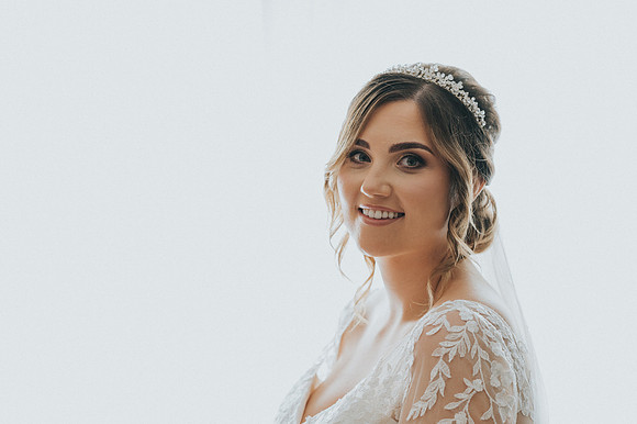 how much should i spend on a wedding photographer