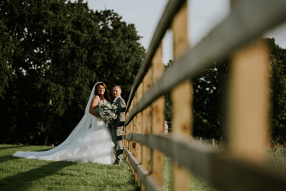 Bride and groom kissing at Canada Lake