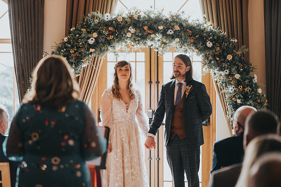 Bridesmaids in chic dresses sharing a toast