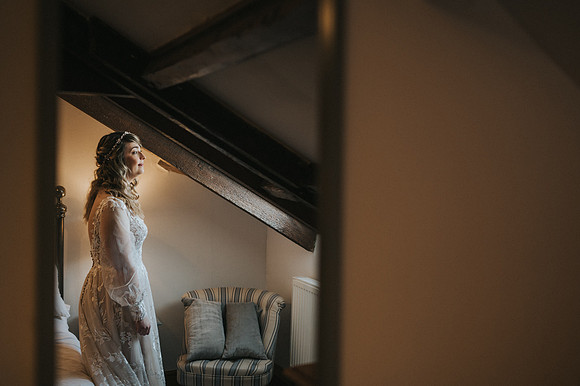 Naomi's elegant bridal hairstyle and makeup details