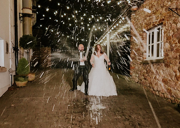 Fun moment with bride and groom's shoes