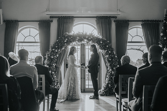 One Vision photographer capturing a candid bridal moment