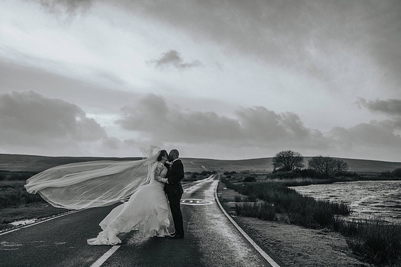 Artistic shot of wedding invitations and decor