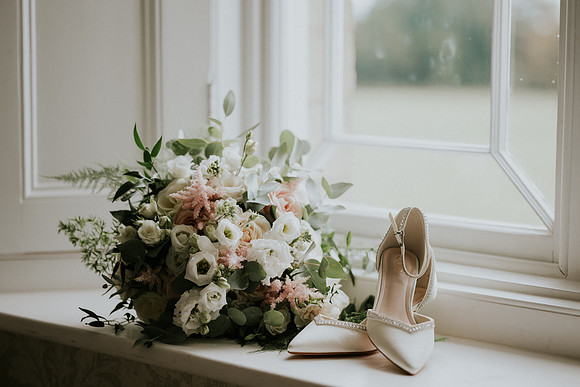 Bridal bouquet with roses and lilies