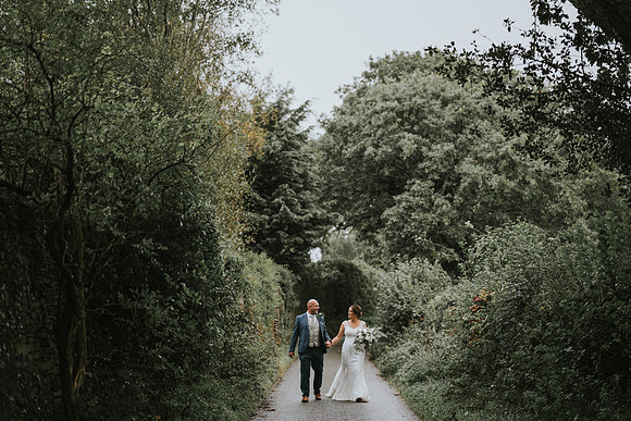 llechwen hall Walking bride and Groom