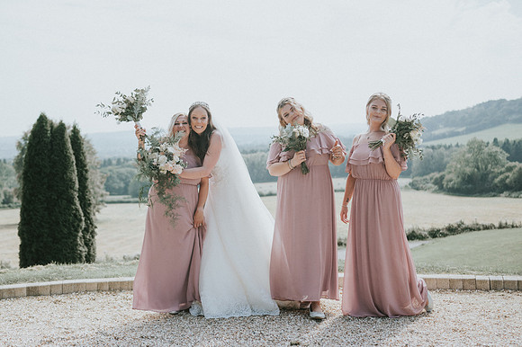Funny brides with family and friends in south wales
