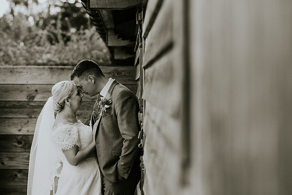 Bride's bouquet with Barn at Brynich in the background