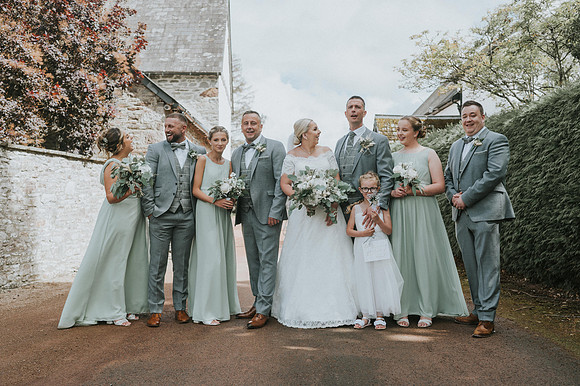 Bride and groom sharing a moment outside Barn at Brynich