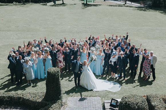 A panoramic view of the wedding venue with guests.