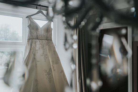 Lorna & Aled standing at the altar in Bryngarw House.
