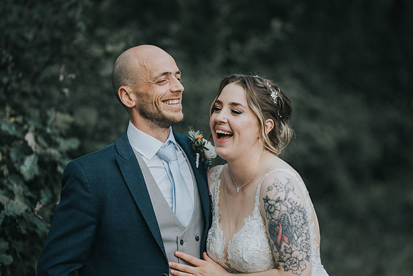 Candid shot of the happy couple at the reception