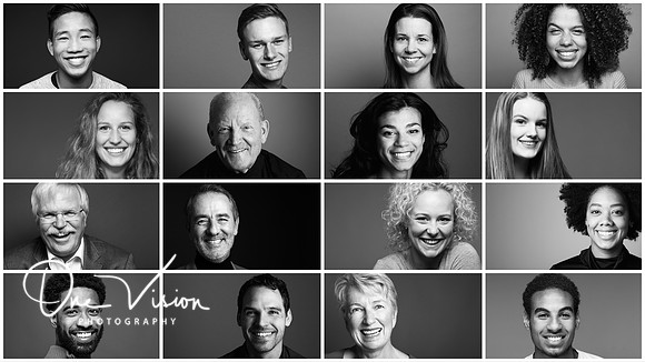 Group of beautiful people in a row in front of a dark background
