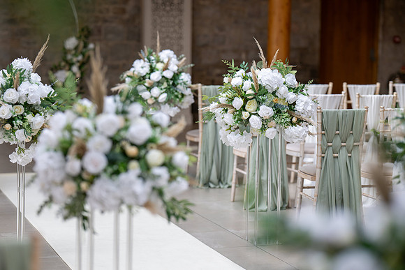 The bridal bouquet, featuring a vibrant array of seasonal flowers.